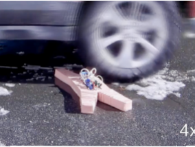 Indestructible robot: not afraid of fire, or a car wheel (Video)